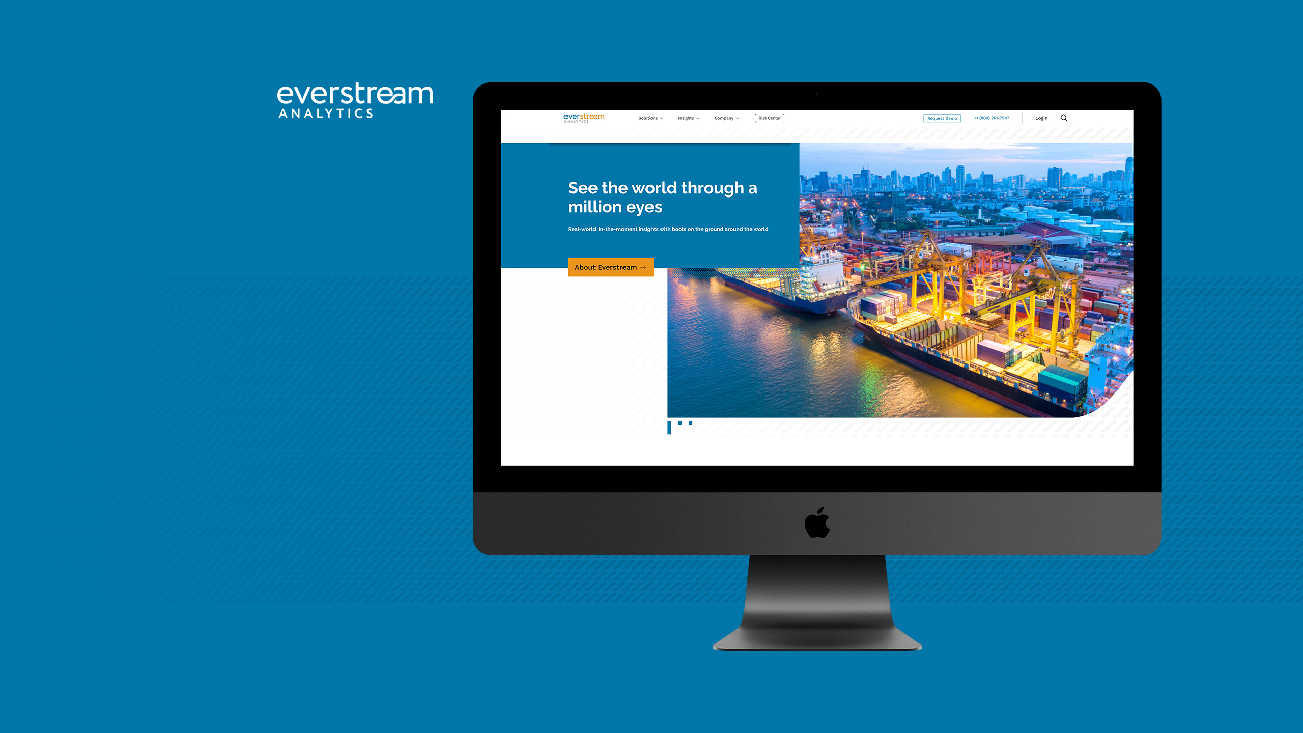 Everstream Analytics webpage displayed on monitor with port scene.