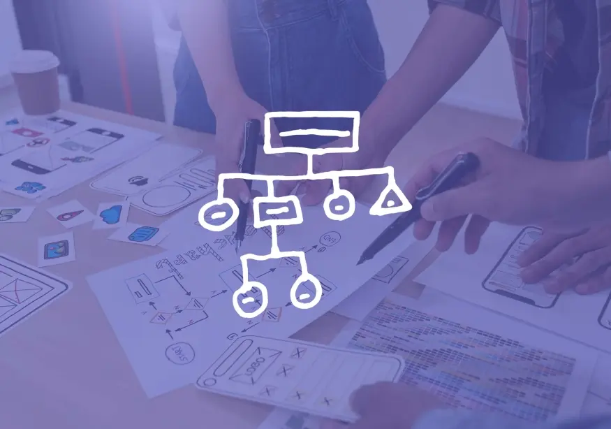 Team collaborating over design papers with flowchart overlay.
