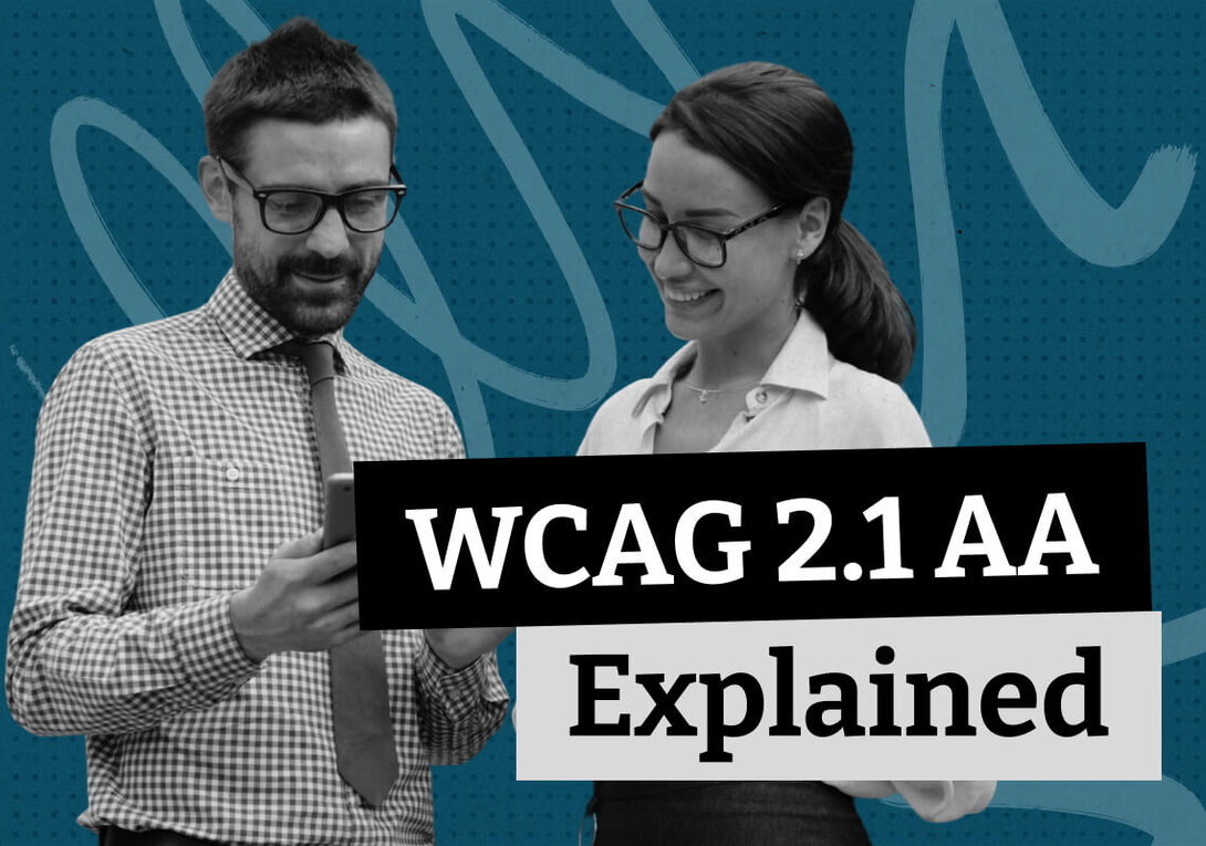 Man and woman discussing WCAG 2.1 AA requirements, smiling.