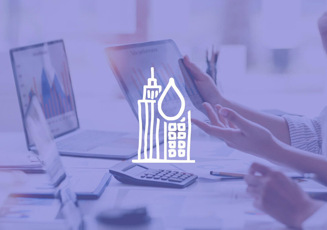 Business meeting with charts and calculator, overlaid with energy icon.