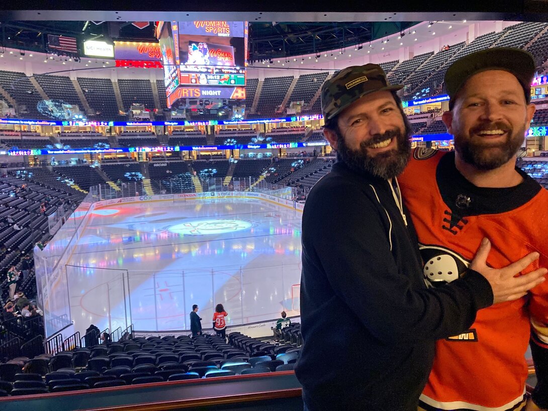 Hounder founders in front of ice rink