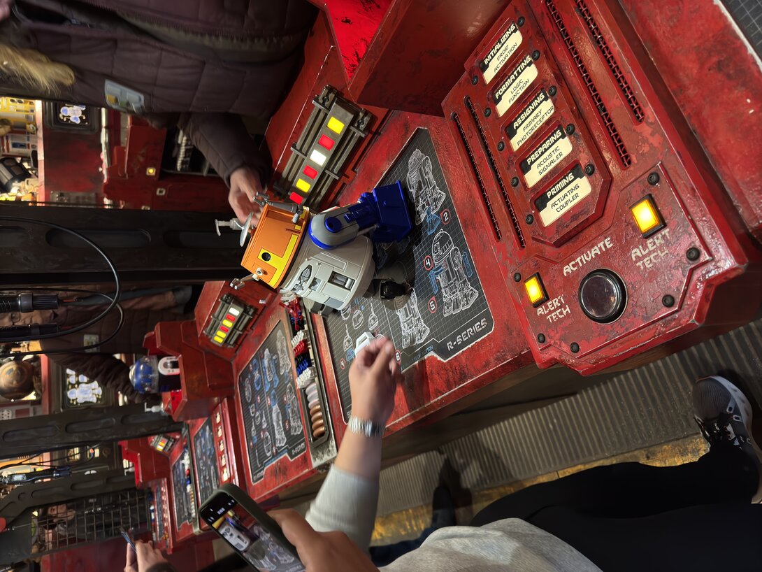 hounder team member building star wars droid