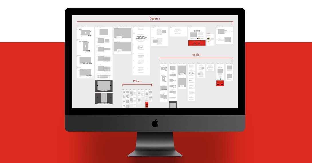 Responsive wireframe designs displayed on a desktop monitor.