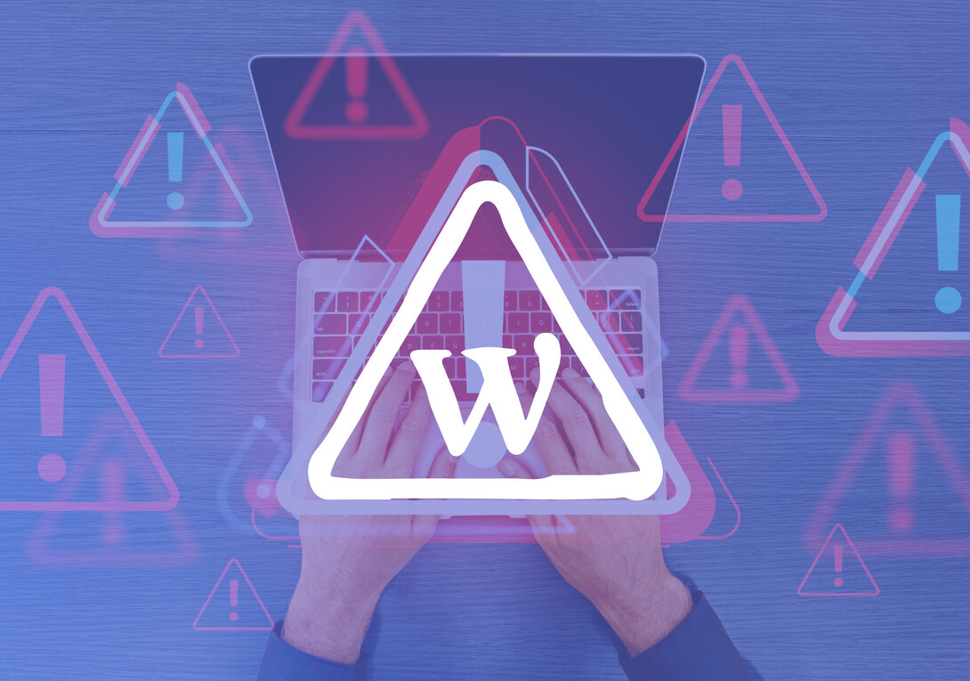 Person typing on laptop with digital warning icons overlayed.